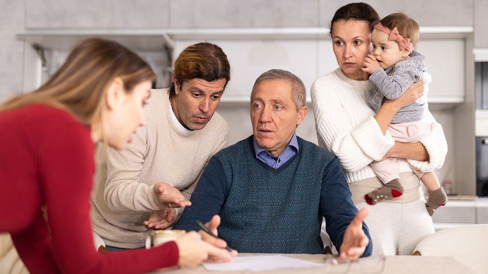 adult siblings parent disagree kitchen table