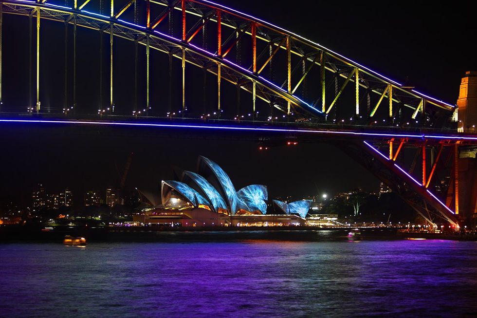 AUSTRALIA Sydney Harbour Bridge and Opera Hopuse lit in vibrant colours