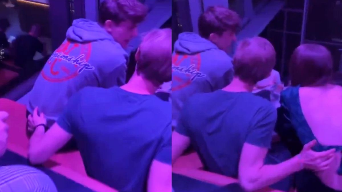 Bisexual man giving back rubs to a man and woman in viral video