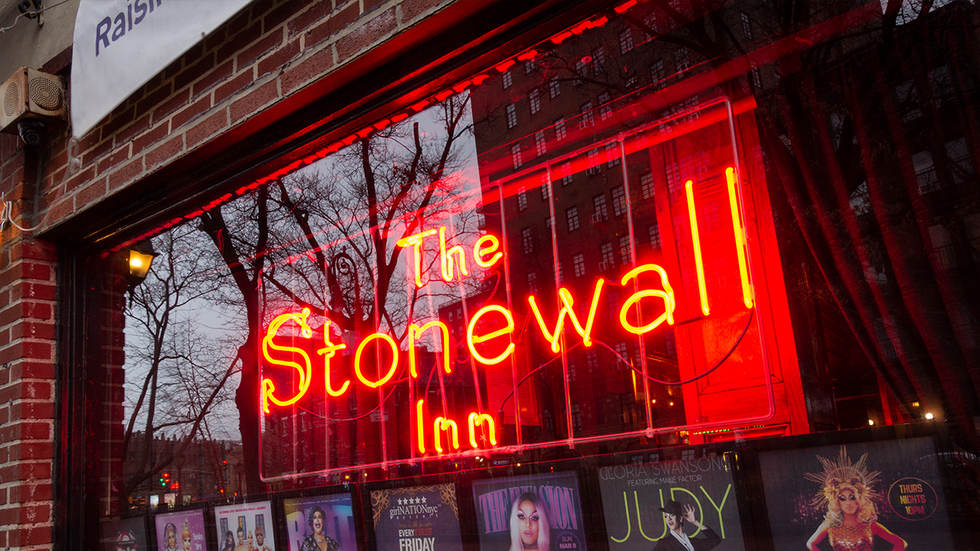 Closeup on the window and sign of The Stonewall Inn. Gay bar & National Historic Landmark, site of the 1969 riots that launched the gay rights movement.