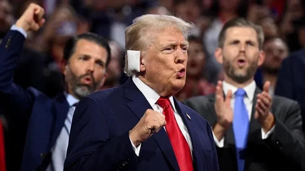 DJT former president donald trump bandaged ear cheering RNC 2024 Eric Trump DonaldJr following along