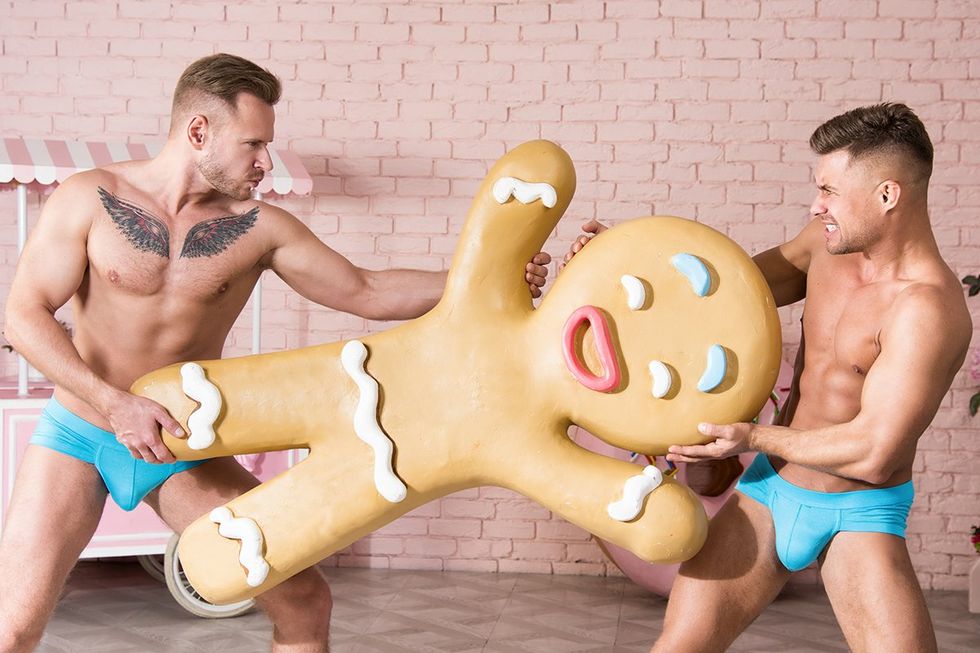 Fight for gingerbread. Two funny guys.