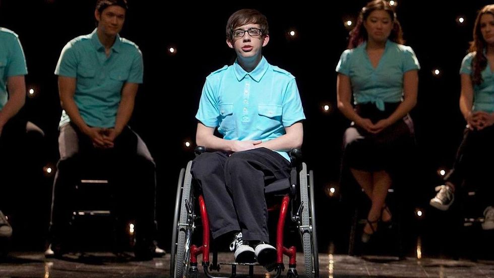 footage still glee fox tv show Kevin McHale artie wheelchair user on stage