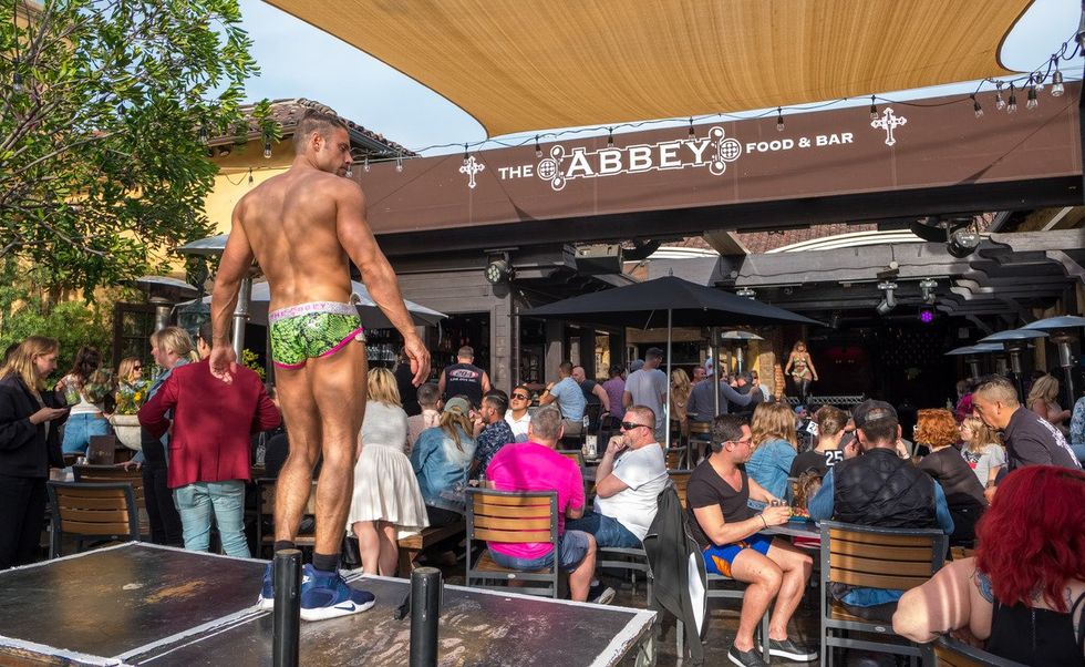 Gay man dances at The Abbey