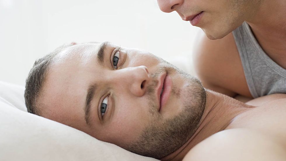 gay poppers: two gay men in bed