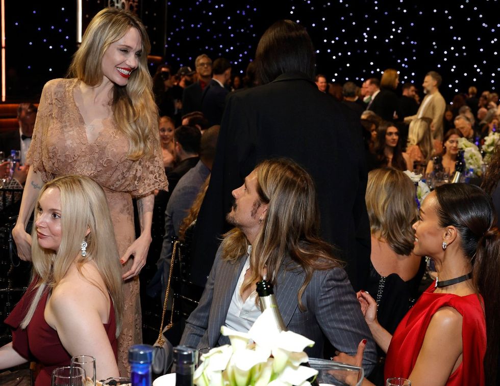 Guest, Angelina Jolie, Marco Perego-Salda\u00f1a, and Zoe Saldana attend FIJI Water at The 30th Critics Choice Awards at Barker Hangar on February 07, 2025 in Santa Monica, California.