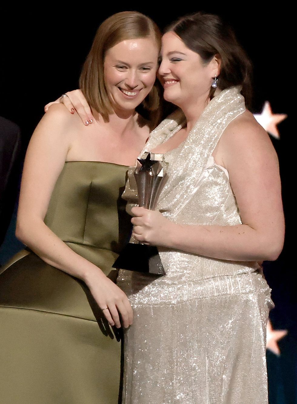 Hannah Einbinder and Megan Stalter accept the Best Comedy Series award for "Hacks" onstage during the 30th Annual Critics Choice Awards at Barker Hangar on February 07, 2025 in Santa Monica, California.