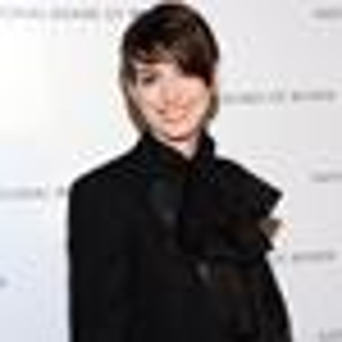 Shot of the Day: Anne Hathaway Sizzles in a Suit and Poet's Sleeves 