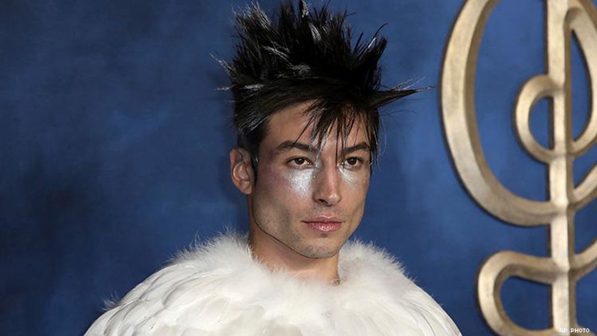 Ezra Miller Dressed As Slain Hedwig on 'Crimes of Grindelwald' Carpet