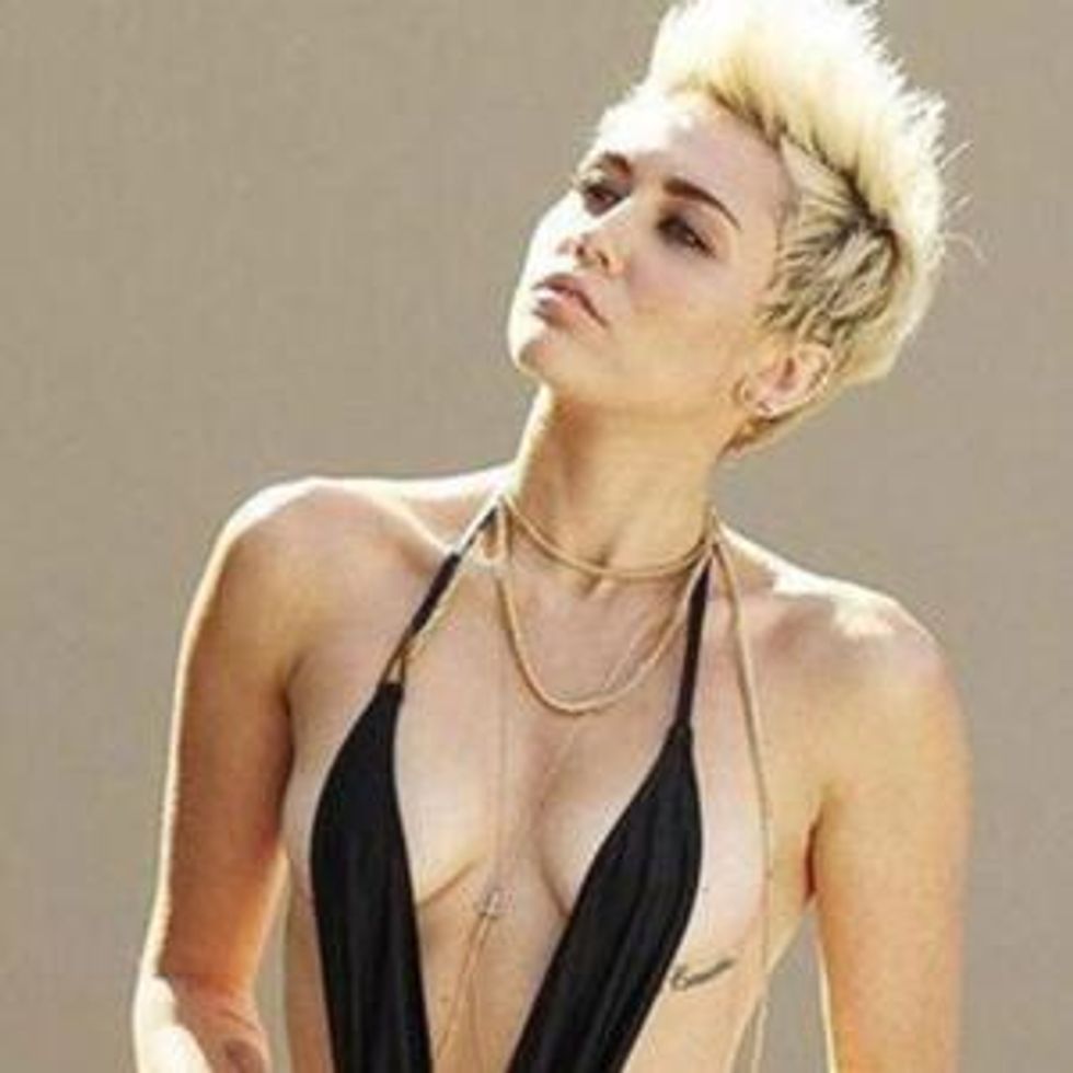 980px x 980px - Shot of the Day: Miley Cyrus Channels Borat in Full-Body Thong
