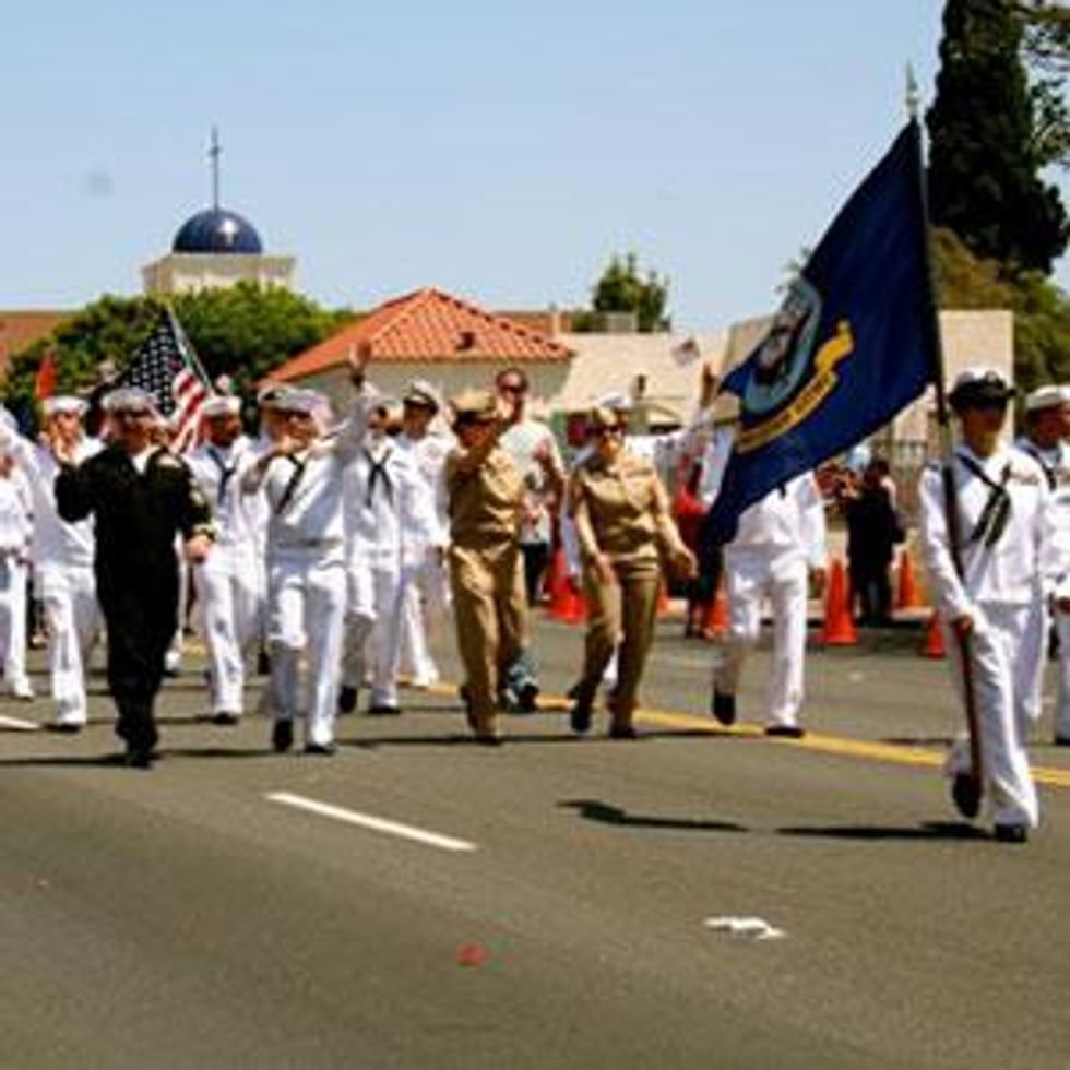 US military members march in full uniform at San Diego gay pride