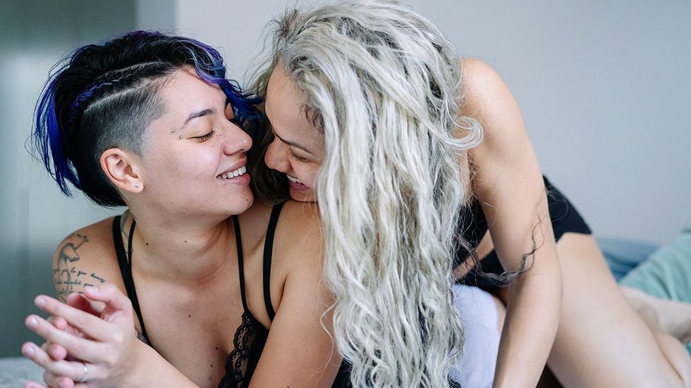 lesbian couple in bed