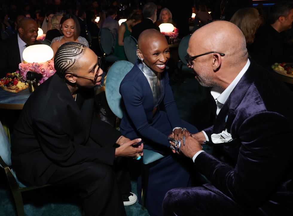 LOS ANGELES, CALIFORNIA - FEBRUARY 02: (L-R) Lena Waithe, Cynthia Erivo and Harvey Mason jr., CEO, MusicCares & Recording Academy attend the 67th Annual GRAMMY Awards at Crypto.com Arena on February 02, 2025 in Los Angeles, California.