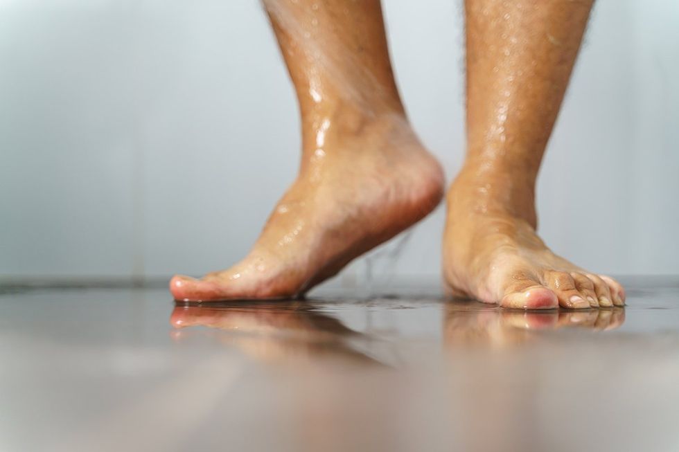 mens feet in the shower