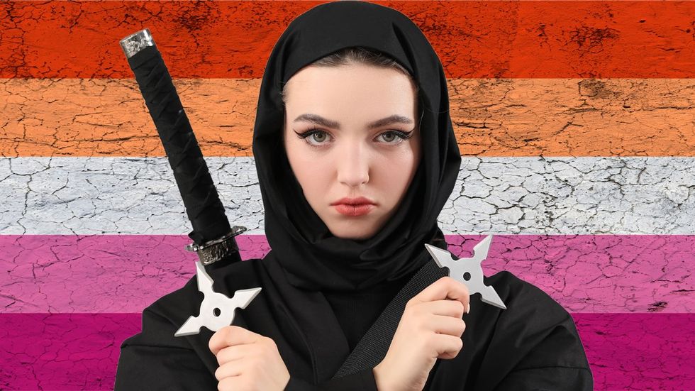 ninja lesbian: female ninja in front of a lesbian flag