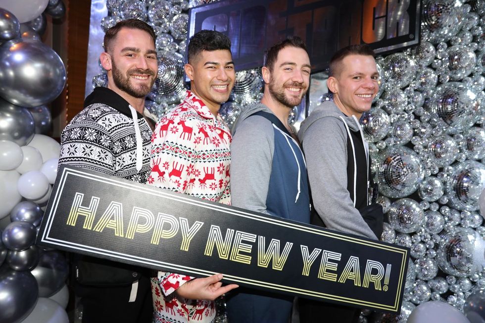 photo gallery Sidetrack Chicago gay bar New Years Day onesie party