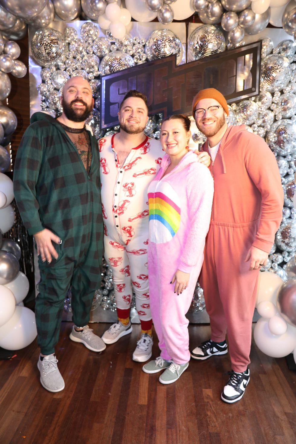 photo gallery Sidetrack Chicago gay bar New Years Day onesie party