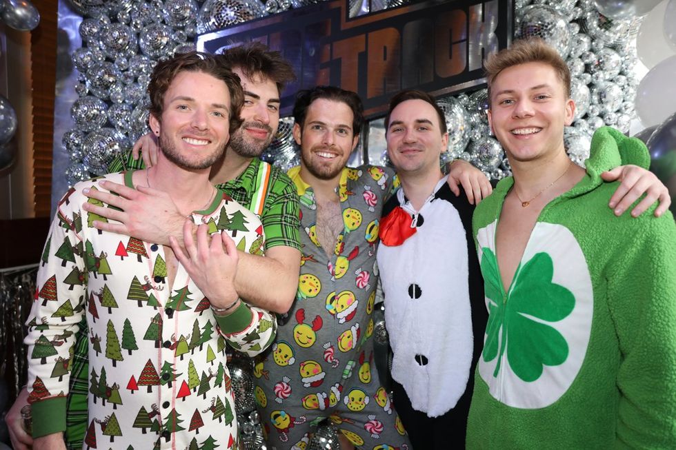 photo gallery Sidetrack Chicago gay bar New Years Day onesie party