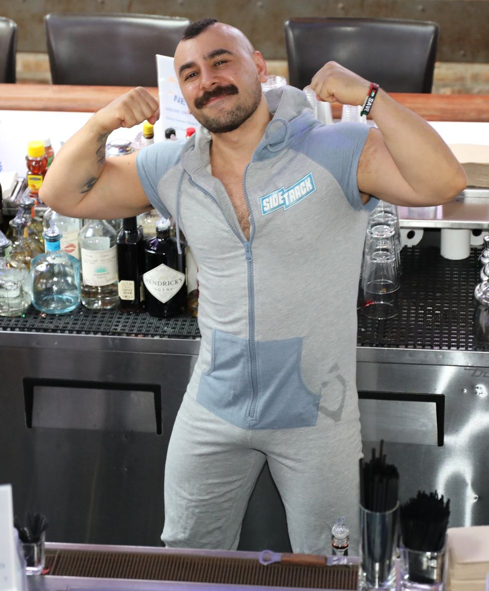 photo gallery Sidetrack Chicago gay bar New Years Day onesie party