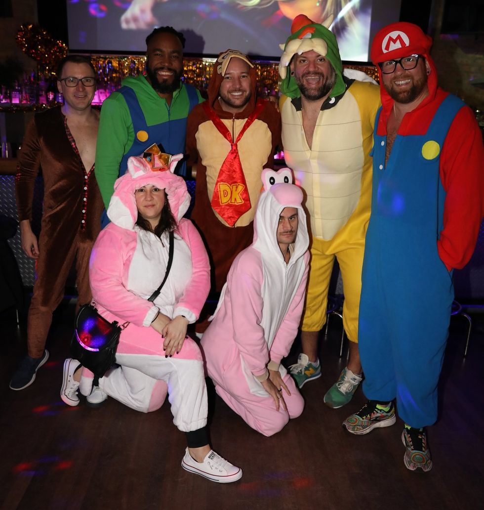 photo gallery Sidetrack Chicago gay bar New Years Day onesie party