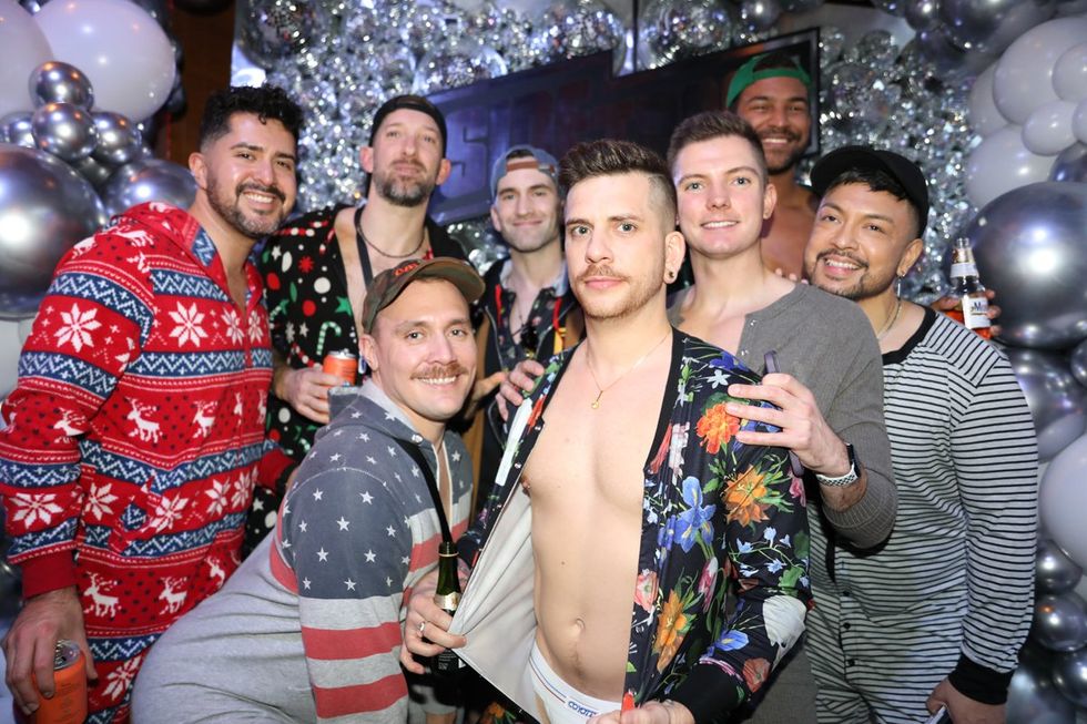 photo gallery Sidetrack Chicago gay bar New Years Day onesie party