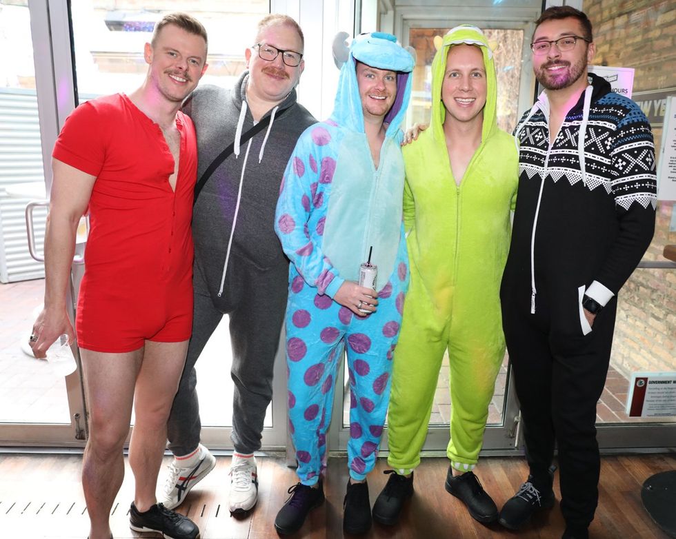 photo gallery Sidetrack Chicago gay bar New Years Day onesie party