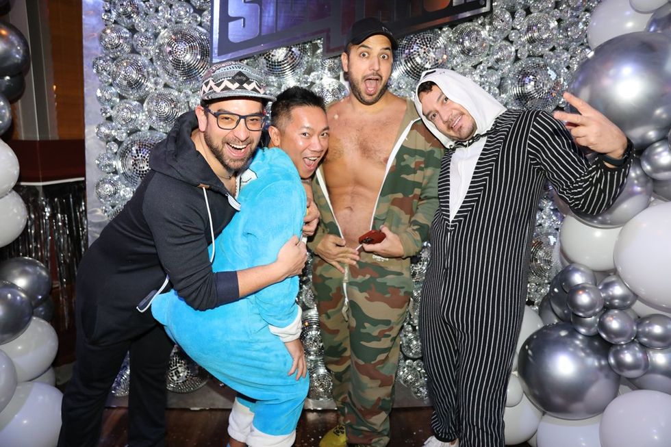 photo gallery Sidetrack Chicago gay bar New Years Day onesie party