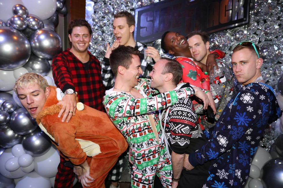 photo gallery Sidetrack Chicago gay bar New Years Day onesie party