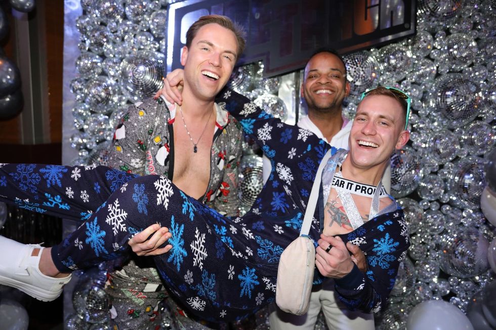 photo gallery Sidetrack Chicago gay bar New Years Day onesie party