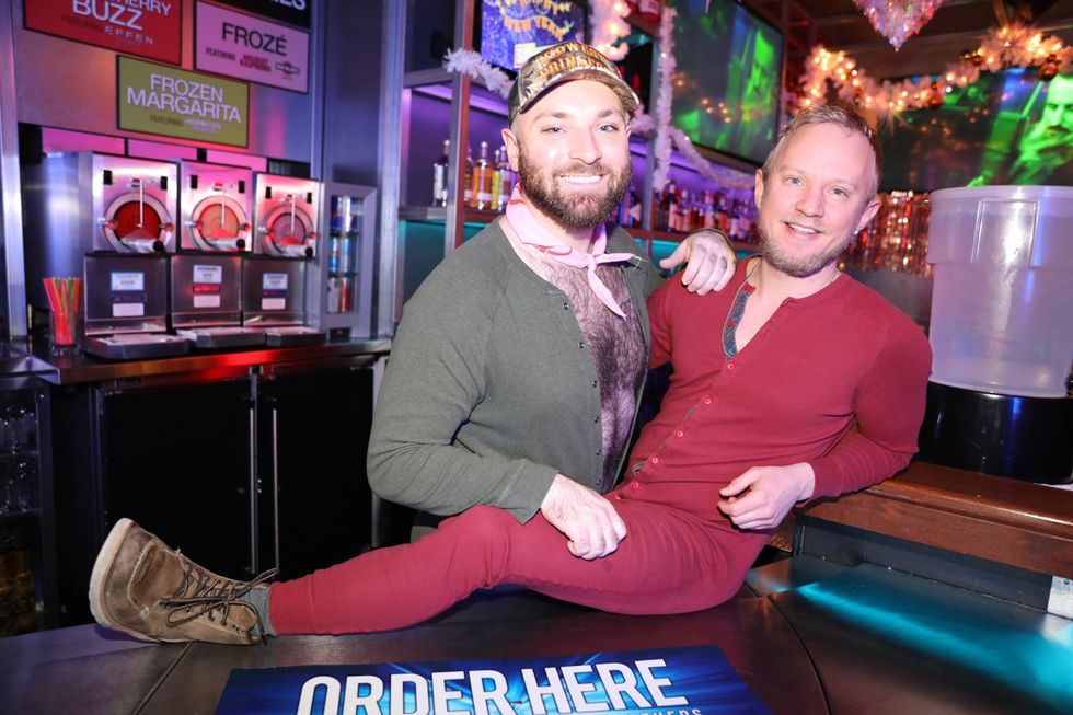 photo gallery Sidetrack Chicago gay bar New Years Day onesie party