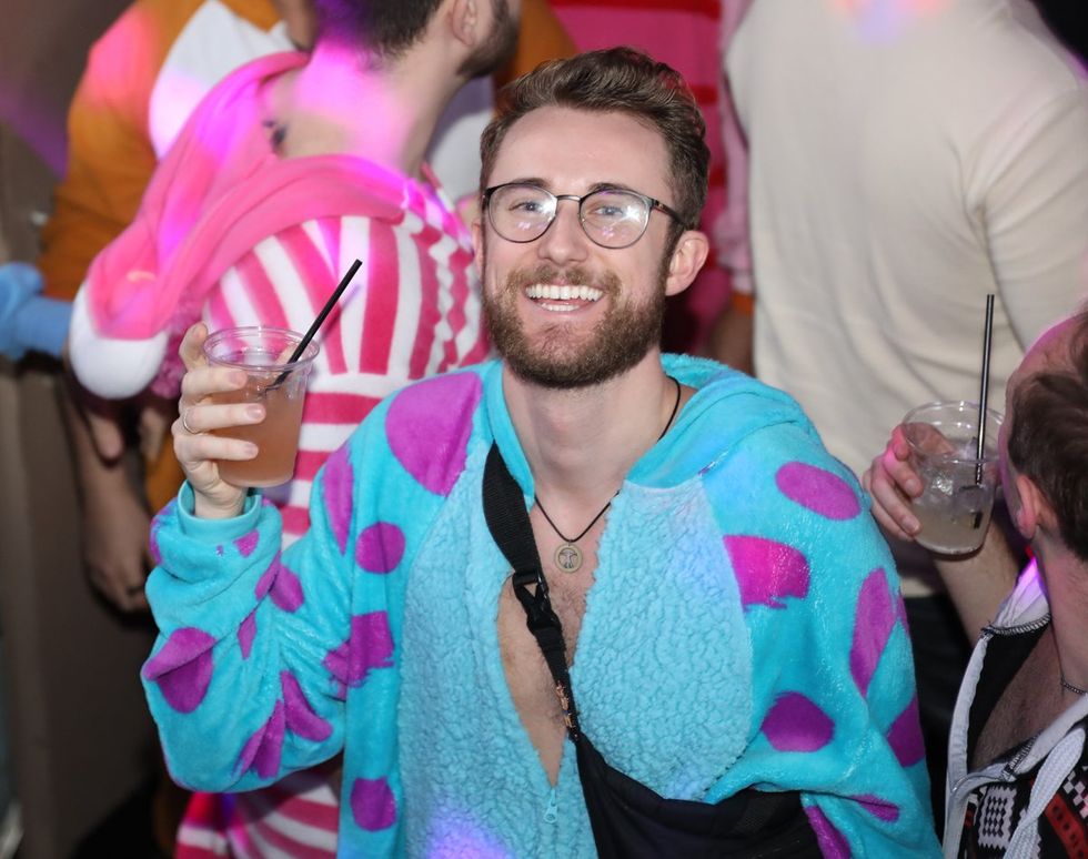 photo gallery Sidetrack Chicago gay bar New Years Day onesie party