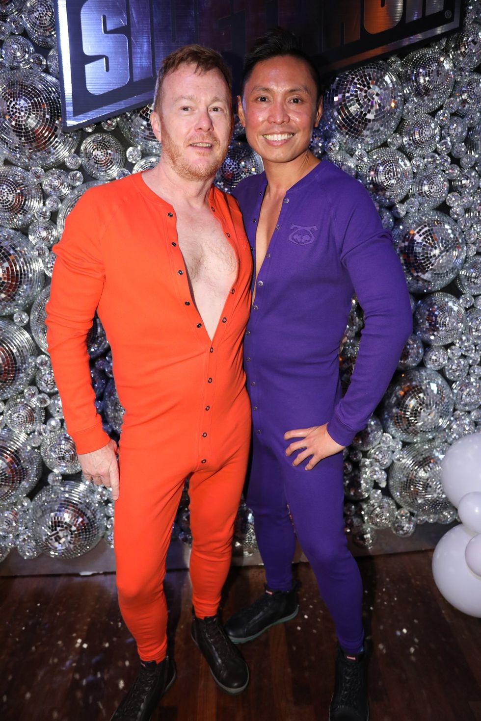 photo gallery Sidetrack Chicago gay bar New Years Day onesie party