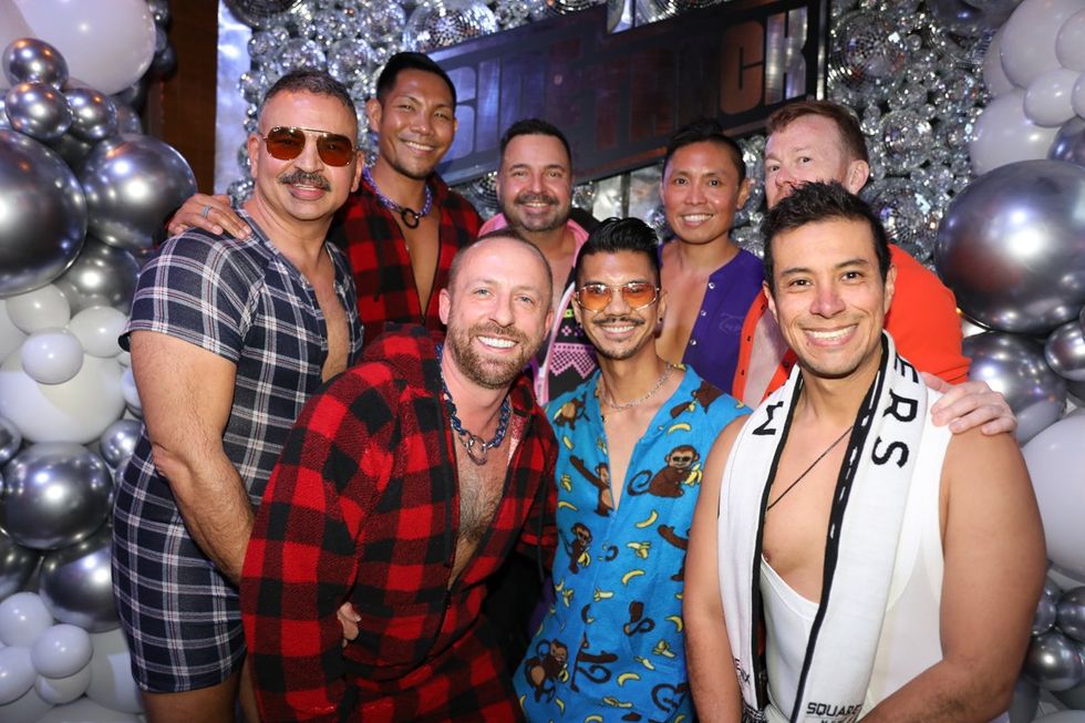 photo gallery Sidetrack Chicago gay bar New Years Day onesie party