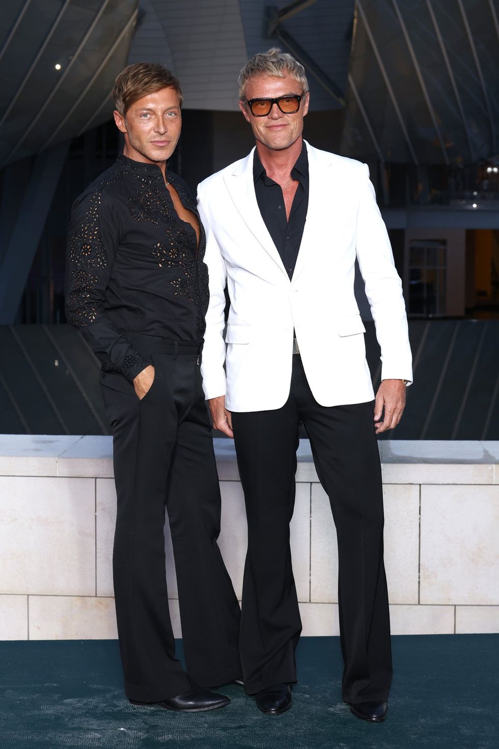 Prelude To The Olympics preparty at Fondation Louis Vuitton Paris France attended by Evangelo Bousis and Peter Dundas