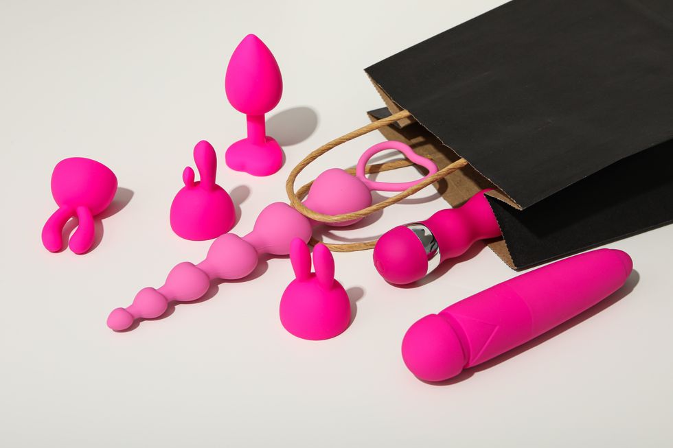 Shopping bag full of sex toys spilling out