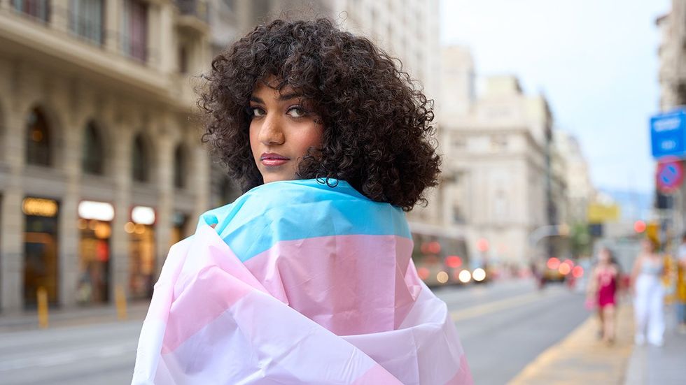 Trans woman in trans flag