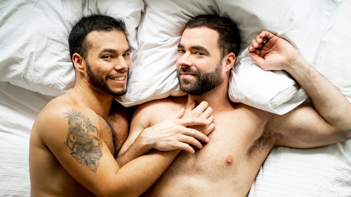 two gay men in bed