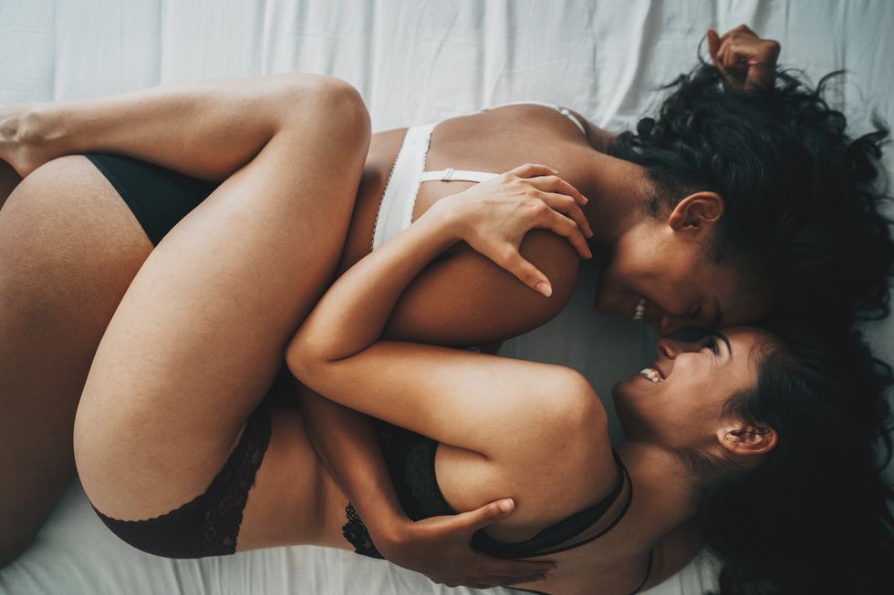 Two lesbians in bed together