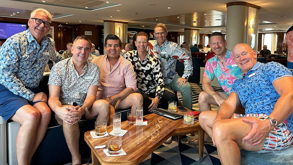 \u200bFinding community on our first luxury LGBTQ+ cruise. The author (second from right) mingles with newfound friends on a Brand g Vacations cruise