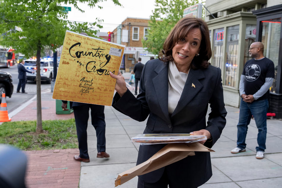 Vice President Kamala Harris holding a vinyl copy of "August and Everything After" by Counting Crows