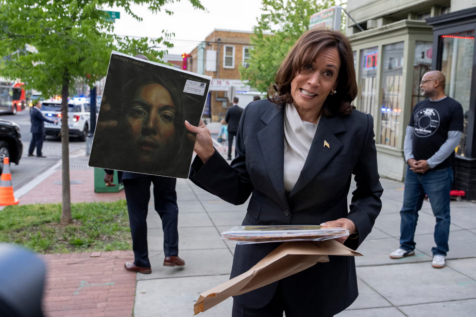 VIce President Kamala Harris holding a vinyl copy of "By the Way, I Forgive You" by Brandi Carlile