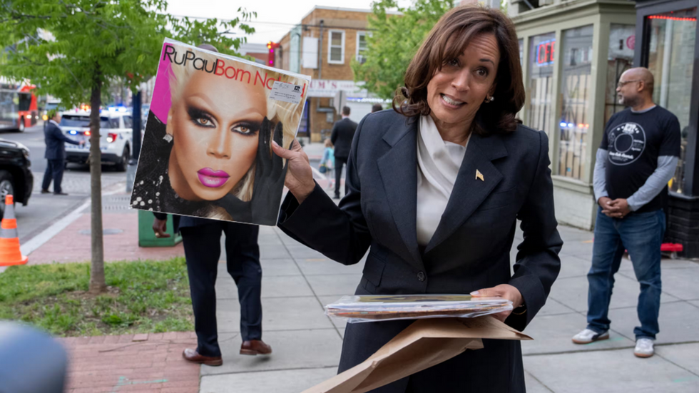 Vice President Kamala Harris holding a vinyl copy of the album "Born Naked" by RuPaul