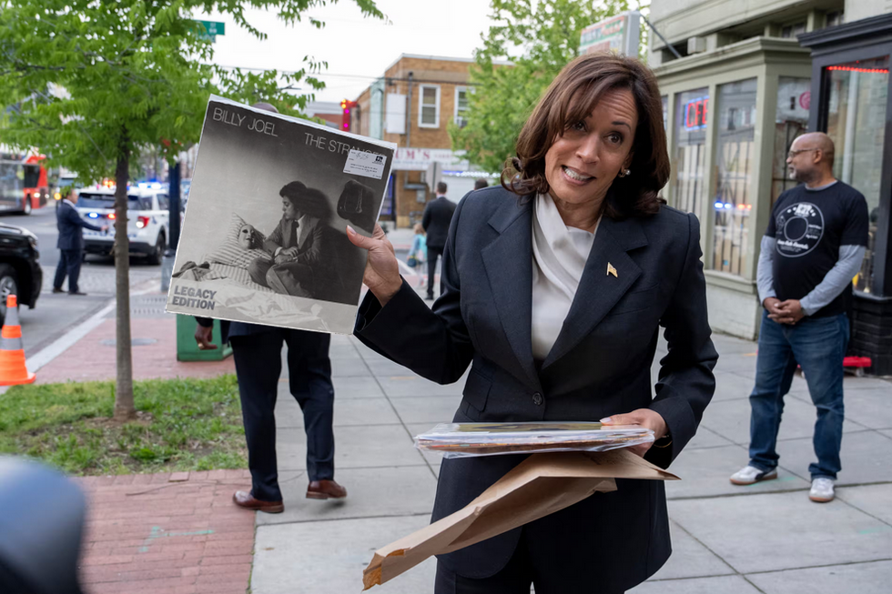 Vice President Kamala Harris holding a vinyl copy of "The Stranger" by Billy Joel