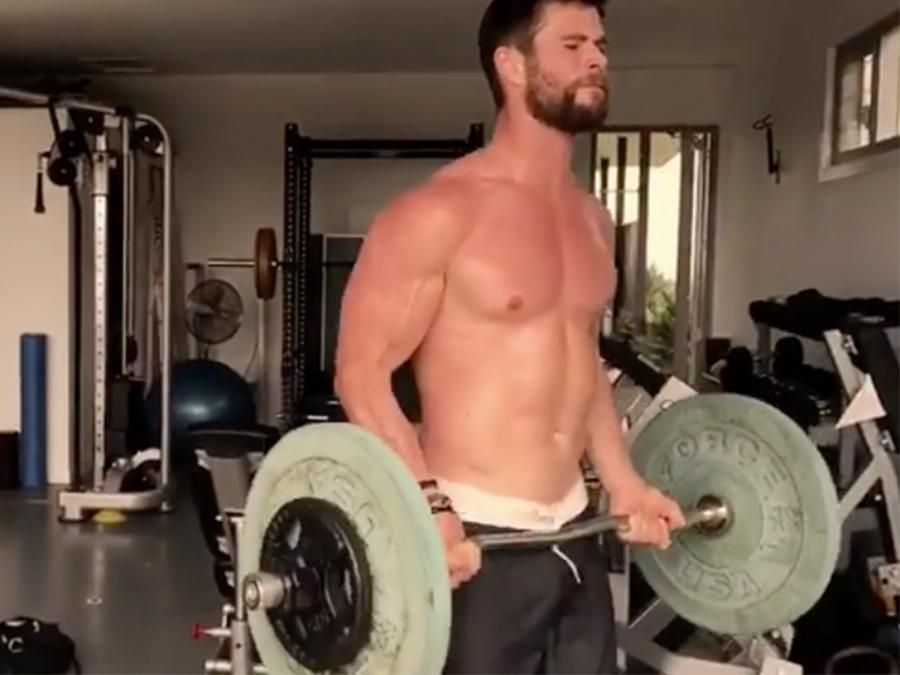 Stop What You Re Doing And Watch Chris Hemsworth Work Out Shirtless