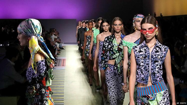 michael kors buys out versace